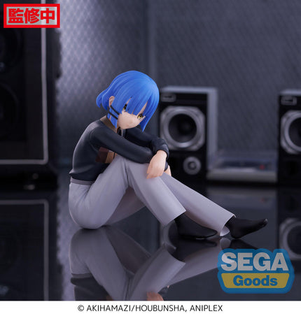 Ryo Yamada PM Perching figure, seated pose against a studio background